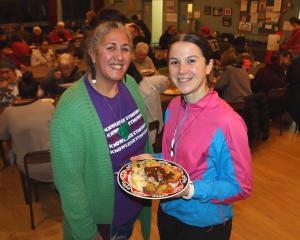 Food fundraiser . . . Gathering for a meal are Araiteuru Marae manager and Pātaka Ora host Tania...