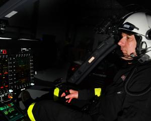 Helicopters Otago pilot Steve Clarke sits at the controls of the helicopter that was targeted by...