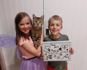 Felicity and Hugo Brice (seen here with their cat Tiger) gave personalised ‘‘thank yous’’ to...