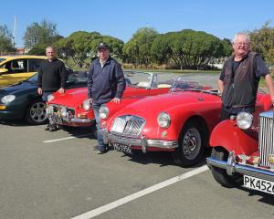 Showing off their MGs are (from right) Grant Stewart (1950 MG TD), Neil Manchester (1956 MGA),...