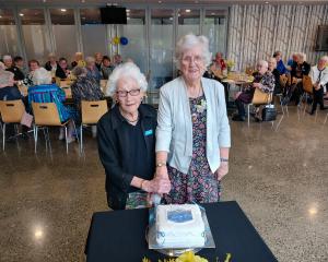 Cutting the cake to mark the 120th anniversary of the establishment of the South Canterbury Women...