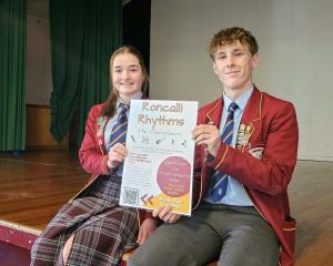 Getting the word out about Roncalli Rhythms are head students Neave Bruin and Carter West, both...