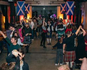 Take a partner... Revellers try out some traditional Scottish dancing during A Ceilidh Affair,...