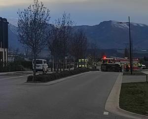 Emergency services at the scene of the crash in Wānaka this morning. Photo: Regan Harris 