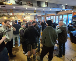 Workers gather in the Clyde tavern after the meeting on the closure of the Winstone Pulp mills....