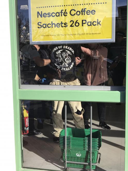 A man is arrested after a stabbing attack in Countdown Central in Dunedin today. Photo: Supplied