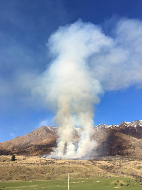 The road to the Remarkables is closed after a controlled burn had breached its “containment line.” Photo: Hugo Hills