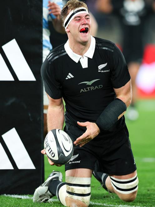 Sam Darry celebrates after scoring a try for the All Blacks against Argentina on August 10. Photo...