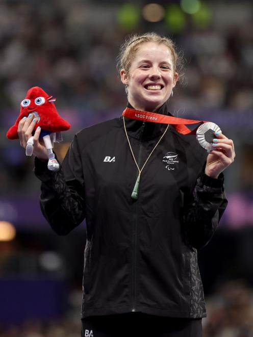 Danielle Aitchison celebrates another silver medal - this time for the Women's 100m Final- T36...