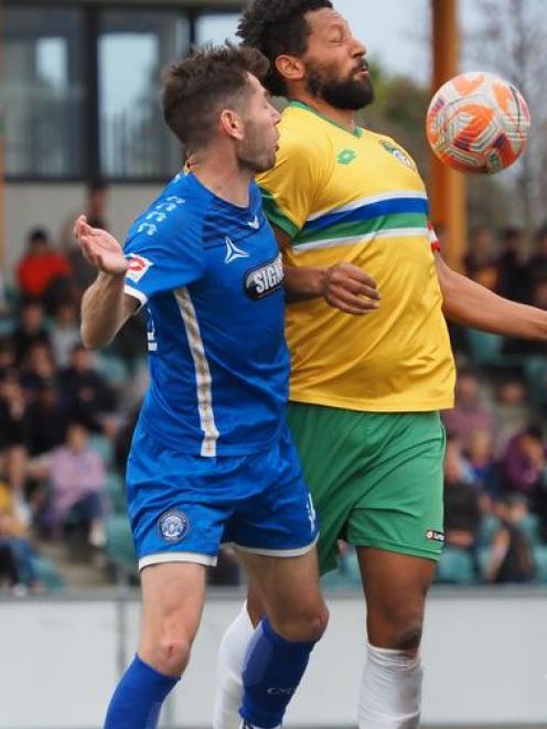 Christchurch United’s Cameron Lindsay and Cashmere Technical captain Andrew Storer compete for...