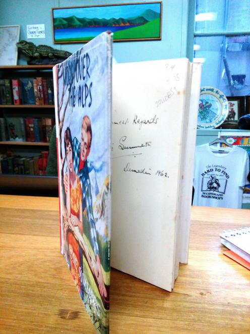 An autographed first edition copy of  Moon Over the Alps, by Essie Summers, published in 1962 and...