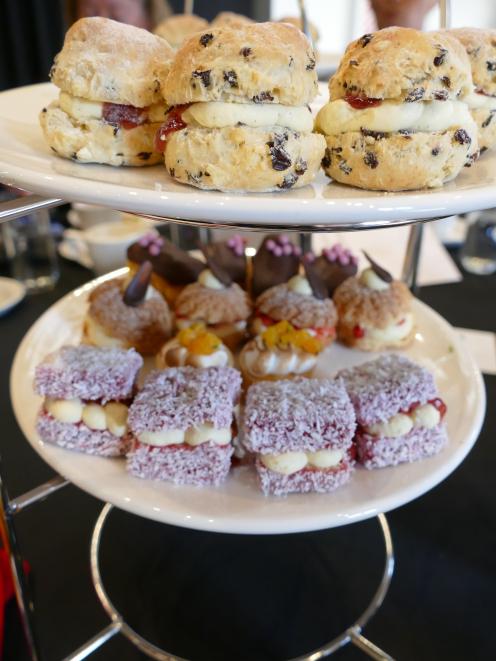 Each honoured guest and their family enjoyed a high tea of sandwiches, scones and cake. PHOTOS: ...