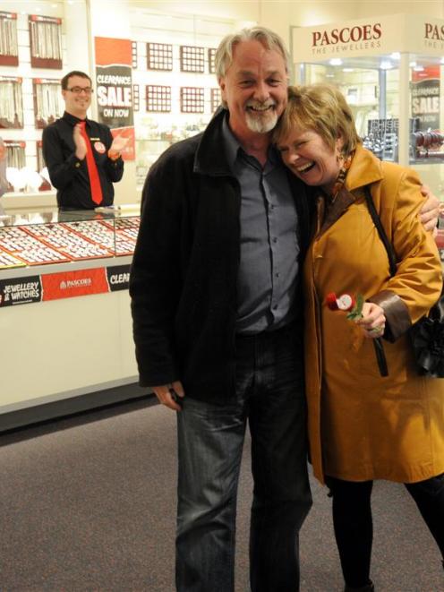 A smiling Jo Hurdle accepts George Procter's marriage proposal  yesterday. Photo by Craig Baxter.