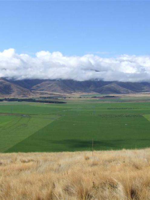 A view looking down on Doug McIntyre's irrigation and dairy development between Omarama and...