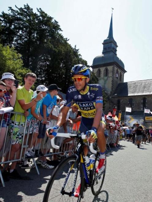 Alberto Contador of Spain arrives for the start of the 197km 10th stage of the Tour de France...