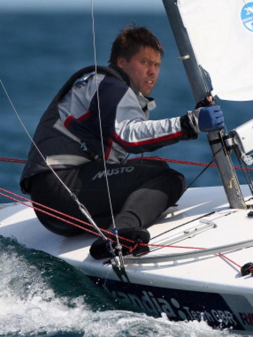 Andrew Simpson of Great Britain in action during a Star Class practice race at the Weymouth and...