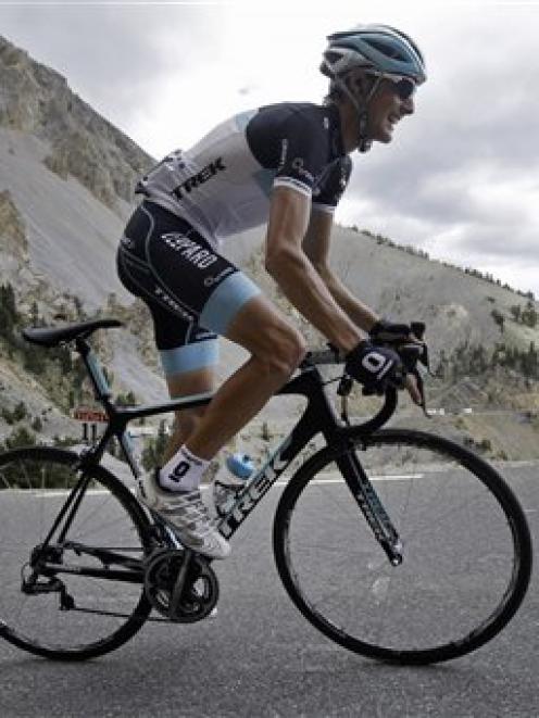 Andy Schleck of Luxembourg climbs Izoard pass as he breaks away from the pack with overall leader...