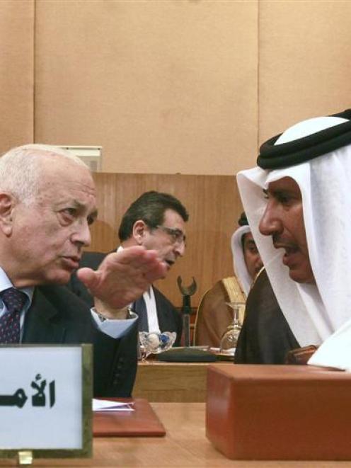 Arab League secretary-general Nabil al-Arabi (left) and Qatari Foreign Minister Hamad bin Jassim...