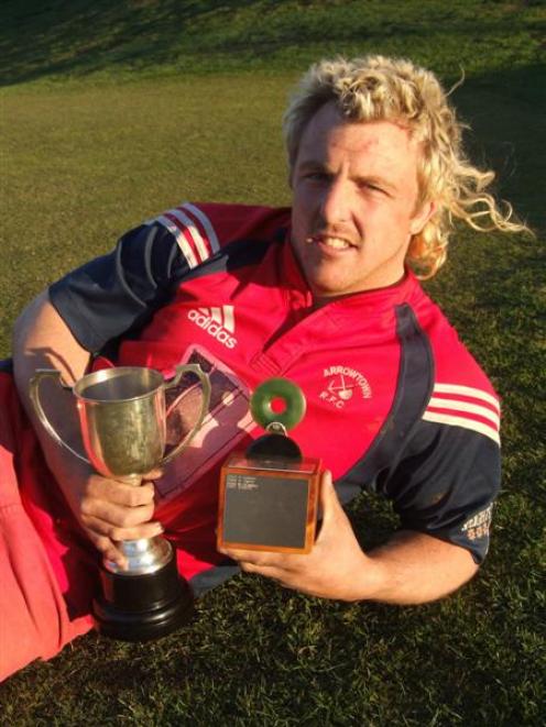 Arrowtown rugby captain Aidan Winter with the Central Otago Rugby Player of the Year and the...