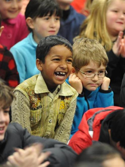 Arthur Street School pupils Hadi Obaidulla (left) and Alexander Jordan (both 6) react as they...