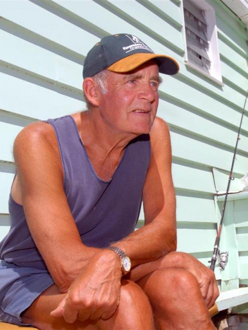 Bob Carson (74), of Dunedin, has enjoyed the sun and the fishing at Lake Mahinerangi for nearly...