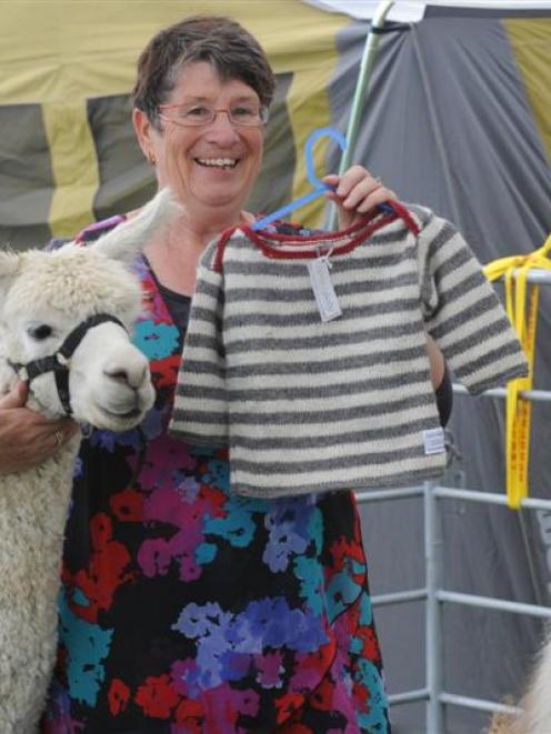 Brenda McLean with a child's jersey made from alpaca fibre at the Southern Field Days at Waimumu...