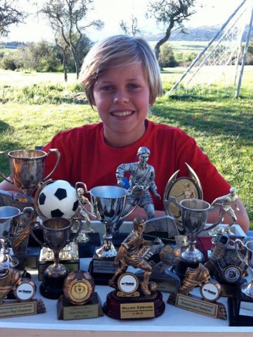 Willem  with his many football awards. Photos by Christina McDonald.