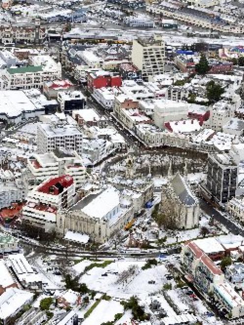 Central Dunedin lies under a blanket of snow. Photo by Craig Baxter.