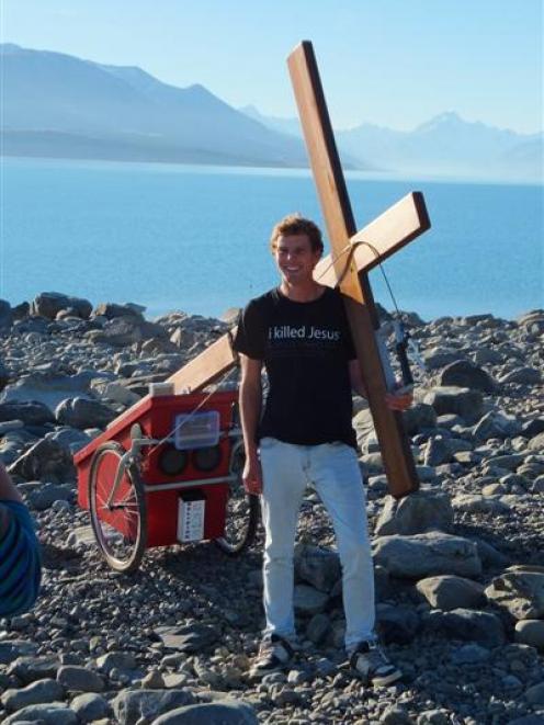 Cross to bear . . . Ryan Craig, pictured at Lake Pukaki with Mt Cook in the background, tries out...