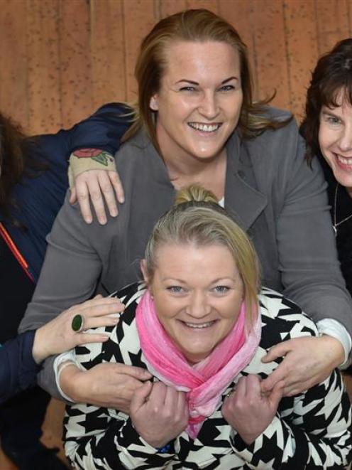 Dunedin breast cancer survivors, Delwyn Jope (front) has had part of her breast reconstruction...