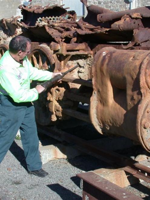 Harry Andrew works on a 1901 Uc locomotive, which he is turning into a static display in the town...