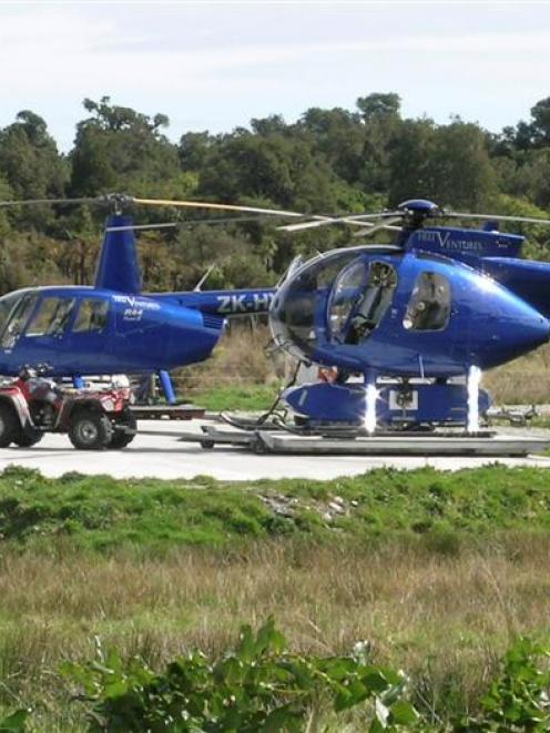 Helicopters outside Heliventures, in Haast, in 2006. Photo by Marjorie Cook.