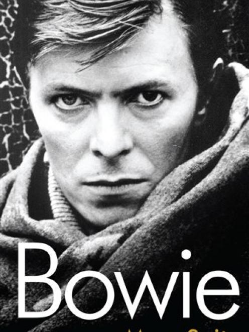 In this book cover image released by Crown Publishing, "Bowie: A Biography" by Marc Spitz, is shown.