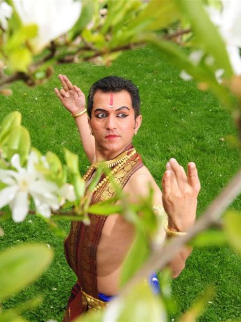 Indian dancer Vivek Kinra strikes a pose from the ancient dance form Bharata-Natyam. Photo by...