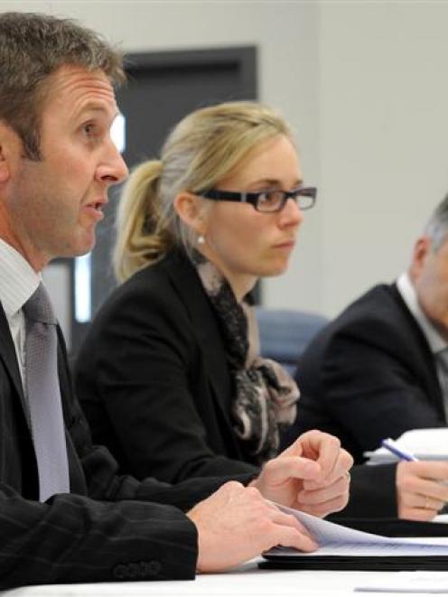 Lawyers (from left) Phil Page and Bridget Irving with Dunedin Mayor Dave Cull and city councillor...