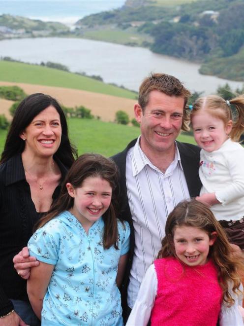 New National list MP Michael Woodhouse with his wife, Amanda, and daughters Emily (10), Isabel (8...