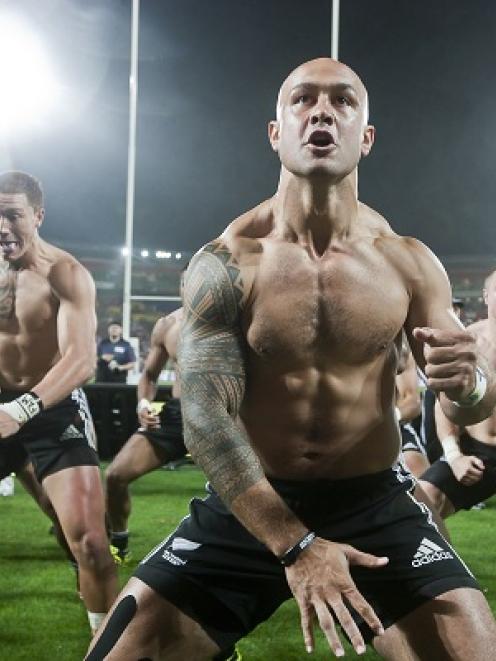 New Zealand players do the haka after winning the final of the International Rugby Sevens at...