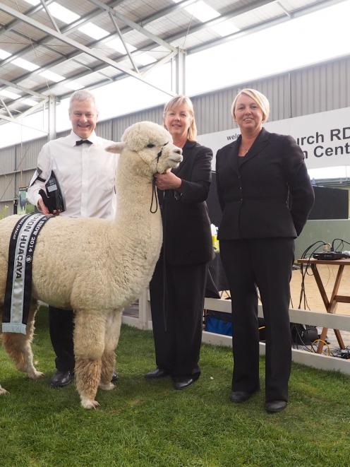 North Canterbury alpaca breeders Chris (left) and Liz Strack were delighted to win supreme...