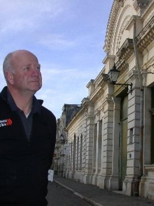 Oamaru Whitestone Civic Trust chairman Marcus Brown contemplates the Harbour St category 2...