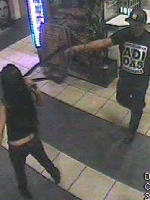 Queenstown police want to speak to this Polynesian or Maori man, wearing a distinctive adidas T...