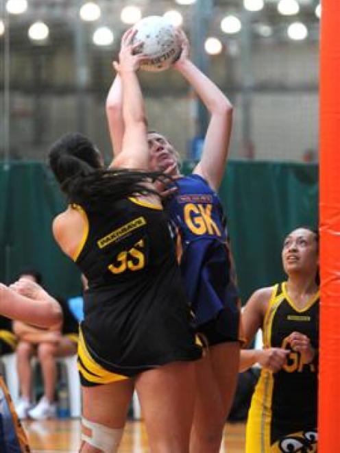 Remarkables goal keep Zoe Walker battles with Cook Strait goal shoot Te Amo Amaru-Tibble as...