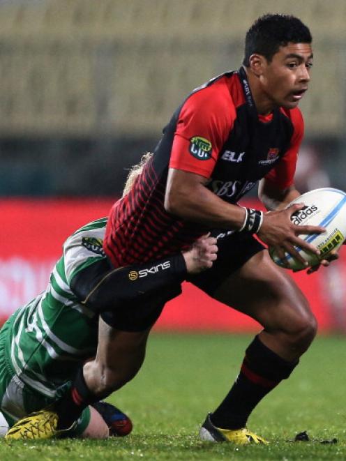 Richie Mo'unga looks to get past Manawatu's Nate George. Photo Getty Images