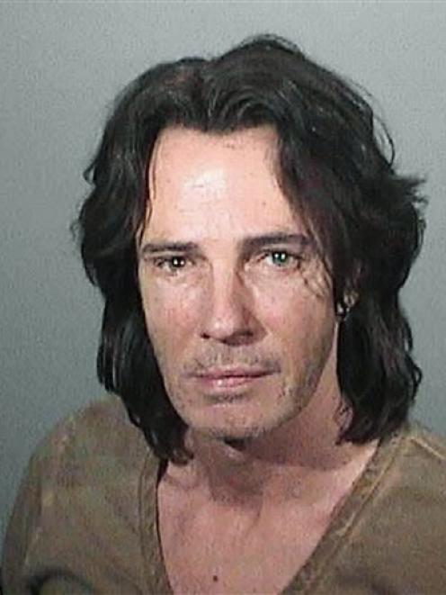 Rick Springfield is shown in a police booking photo after his arrest on suspicion of drink...