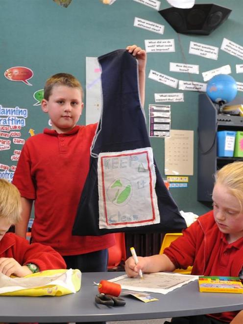 Silverstream School pupils (from left) Joshua Dowden, Oliver Tunnah and Sarah Baird (all 8) with...