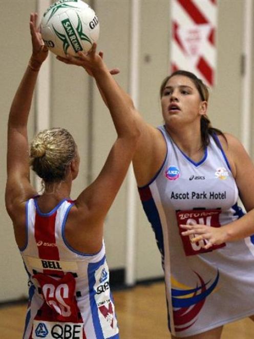 Steel defender Te Huinga Reo Selby-Rickit guards Swifts shooter Erin Bell in a pre-season game at...