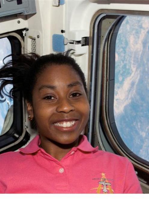 Stephanie Wilson orbits above Earth. Photo by NASA.