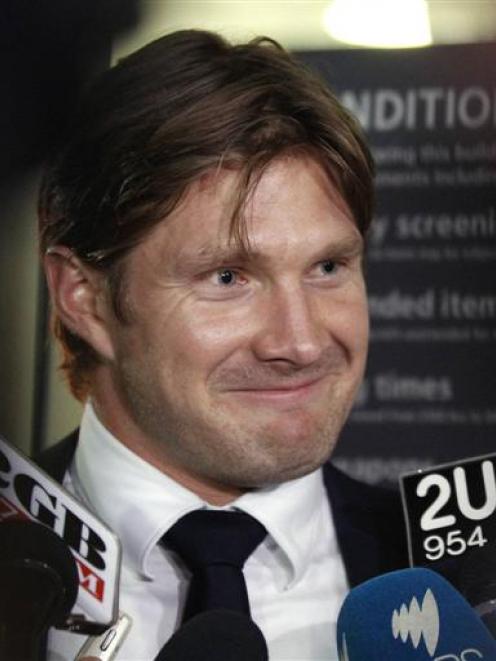 Suspended Australian cricket vice-captain Shane Watson talks to the media after his arrival at...