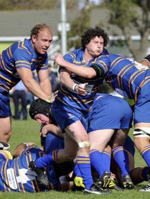 Taieri halfback Ryan Hammer clears to his backs during the premier rugby game against Southern at...