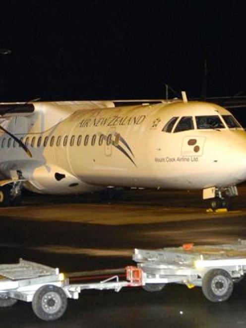 The Air New Zealand ATR at the centre of yesterday's mid-flight drama lands safely at Dunedin...