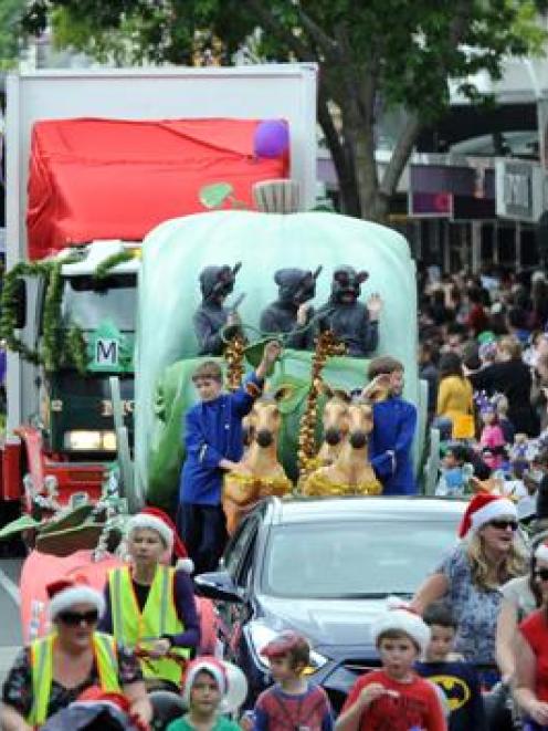 The Dunedin Santa Parade makes its way down George St yesterday. Photo by Craig Baxter.